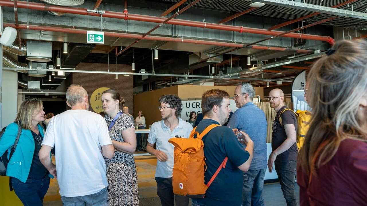 Attendees during the drinks and networking moment